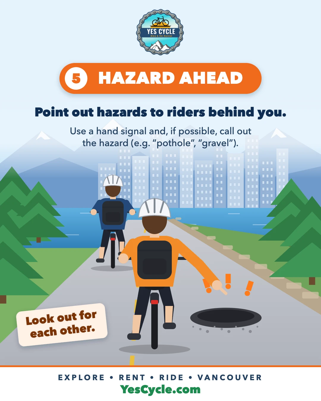 Cyclist pointing down to warn riders behind about a pothole hazard ahead